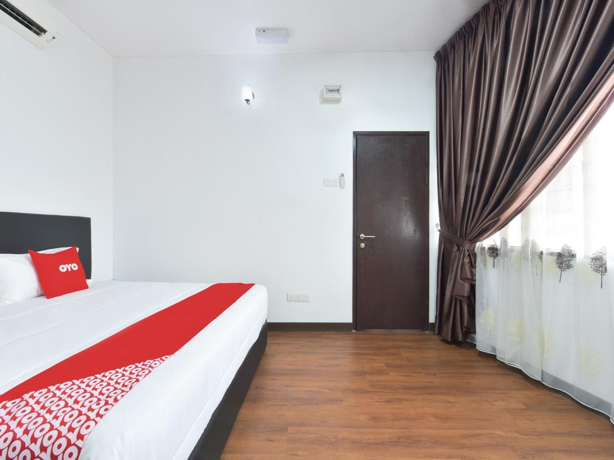 Oyo 90869 Hotel Madeena Inn سيبانغ المظهر الخارجي الصورة